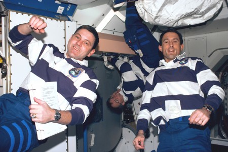 Astronaut James H. Newman (right) wears the Timex Datalink 50 model 70502 on STS-88