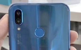 Blue Huawei P20 Lite poses for a photo