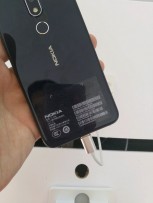 Nokia TA-1099 seen in the bottom left corner of the back panel