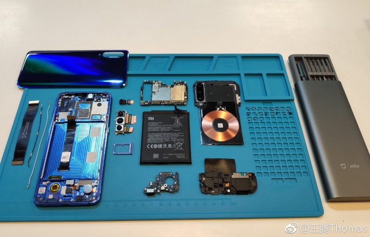 Xiaomi Mi 9 taken apart check out the 20W wireless charging coil