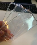 Alleged iPhone XI cases showing a hole for the square camera hump