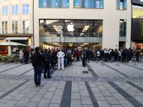 People in Munich waiting to check out the new iPhones