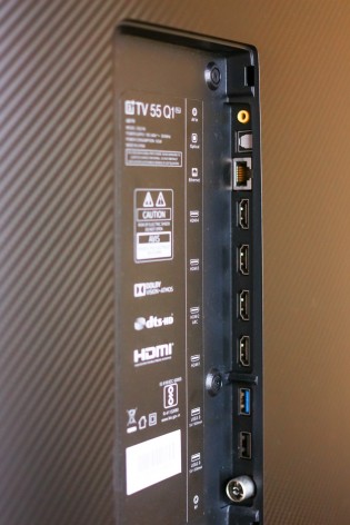 Back of the TV hides the ports under a removable flap