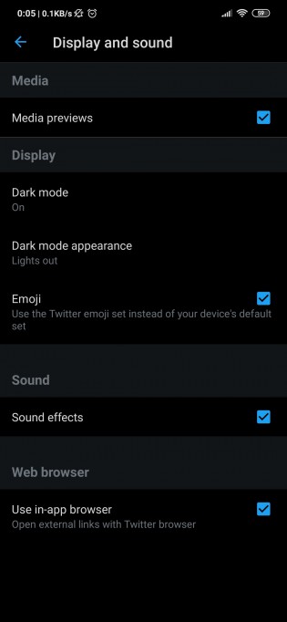 The option to enable Lights out is tucked inside 'Dark mode appearance'