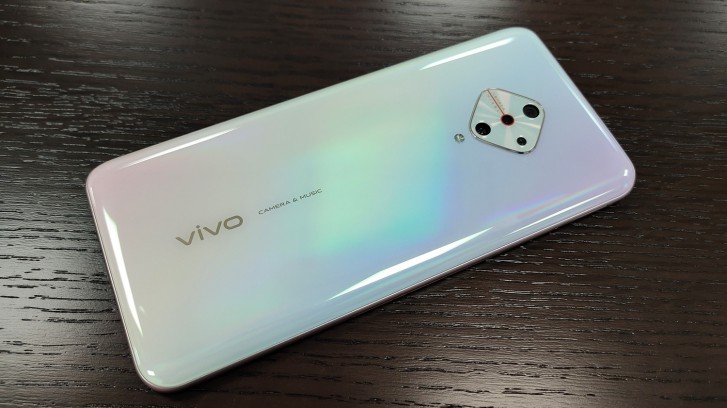 vivo V17 poses for the camera with a notched display and quad cameras