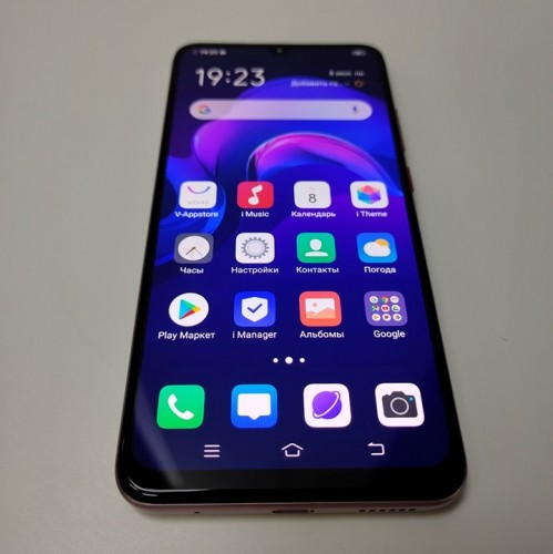 vivo V17 poses for the camera with a notched display and quad cameras