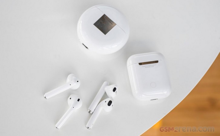 Huawei Freebuds 3 next to 2nd-gen AirPods 