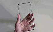 Oppo Find X2 screen protector shows pronounced curves and punch hole cutout
