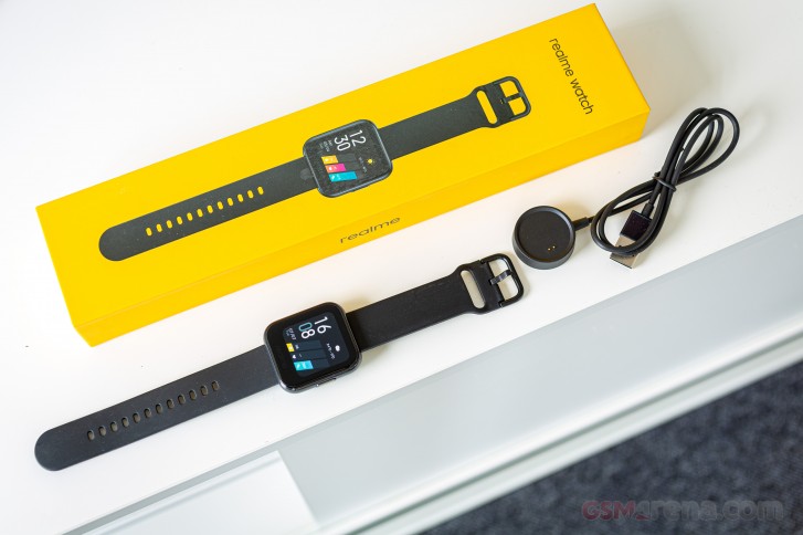 Realme Watch with its circular charger