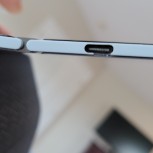 User photos of cracks in the plastic around the USB-C port