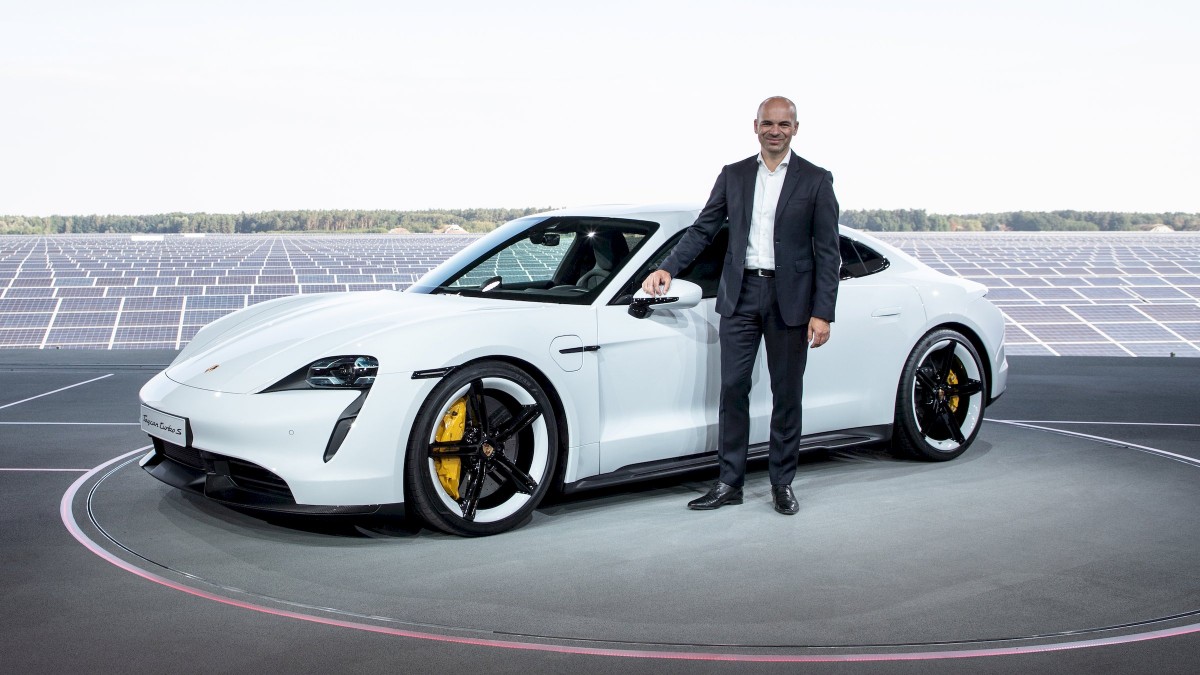 Manfred Harrer, Vice President of Chassis Development, presenting the Porsche Taycan