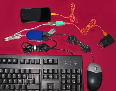 USB On-The-Go allowed users to connect peripherals to their phones <a href="https://en.wikipedia.org/wiki/File:USB-OTG_Setup_IMG_2342.JPG" target="_blank" rel="noopener noreferrer">image credit</a>