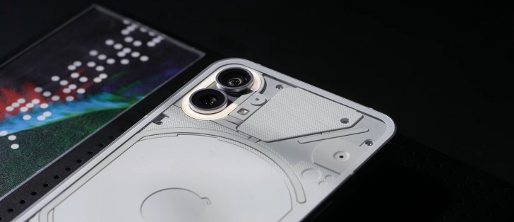Nothing phone (1) poses for the camera with glowing lights - Vimarsana News