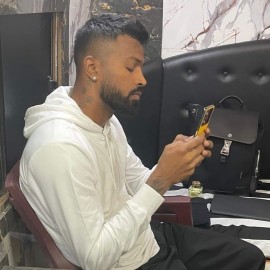 Hardik Pandya handling what looks like the Poco X5