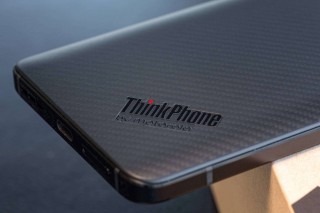 There's a custom ThinkPhone logo and a Red key