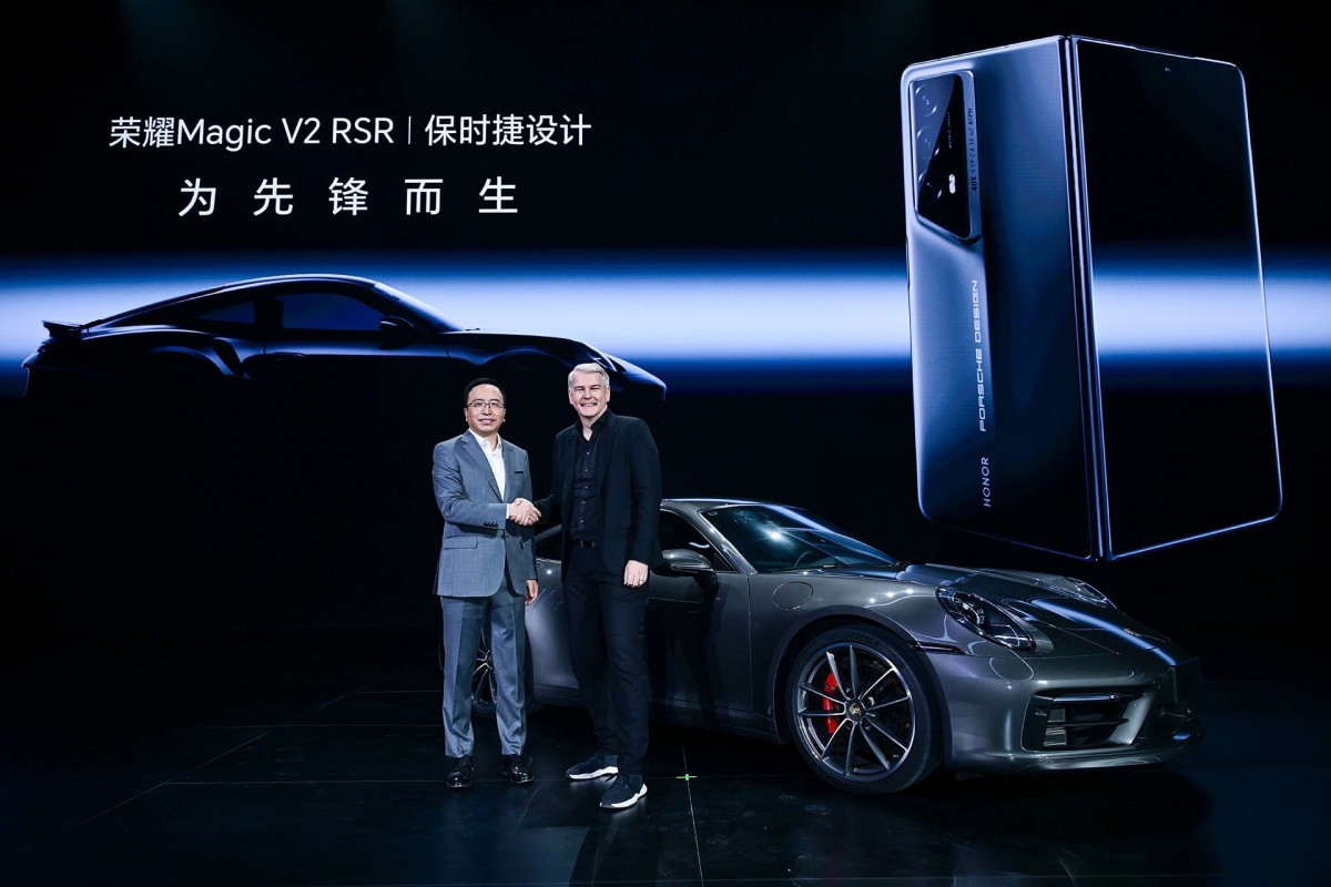 George Zhao, Honor CEO with Stefan Buescher, Chairman of the Executive Board of Porsche Lifestyle Group