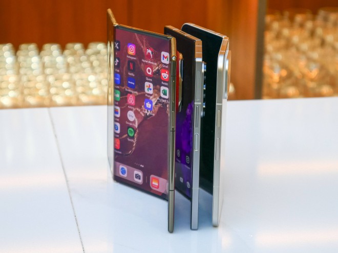 Huawei Mate XT (front), Samsung Galaxy Z Fold6 (center) and Google Pixel 9 Pro Fold (back)