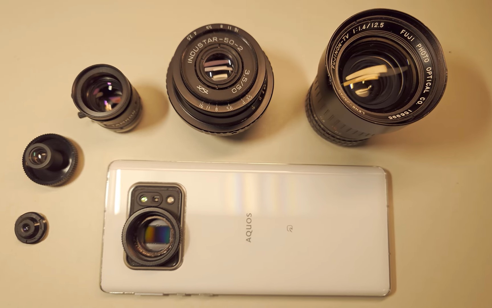 Putting a a real camera lens on a cameraphone with 1-inch sensor is a fascinating mod