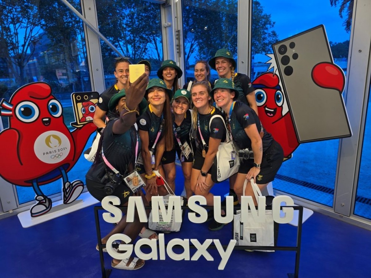 Team South Africa takes a selfie with the Galaxy Z Flip6 Olympic Edition at Samsung Village Plaza