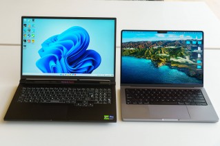 Titan 16 Pro next to a MacBook Pro 14