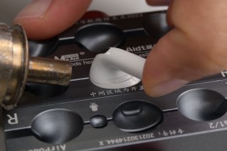 AirPods 5 teardown process (iFixit)