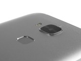 A nicely rounded back side with a small camera bump and convenient fingerprint reader - Huawei G8 review