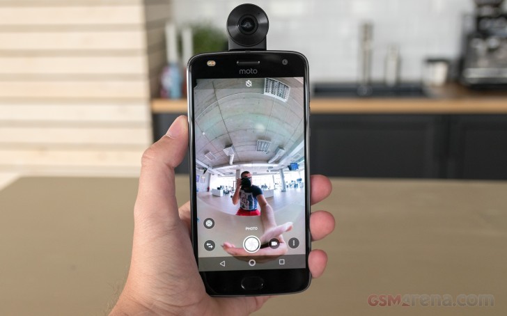 Take pictures with the Moto 360 Camera